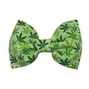 The 420 Cannabis Leaf Dog Bowtie features a stylish green design with various shades of cannabis leaves.