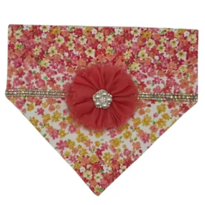 Floral dog bandana with pink flower accent.