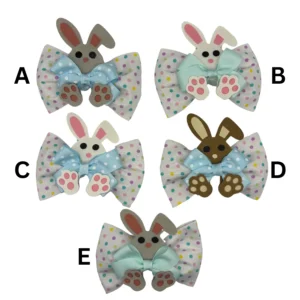 Five colorful polka dot bowties with bunny faces.
