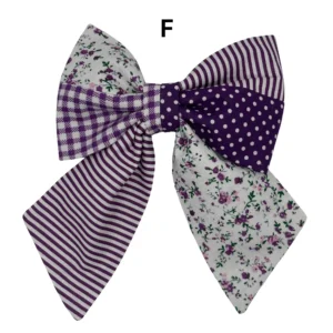 Purple and white floral patterned hair bow.