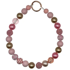 Pink and gold beaded bracelet with varying textures