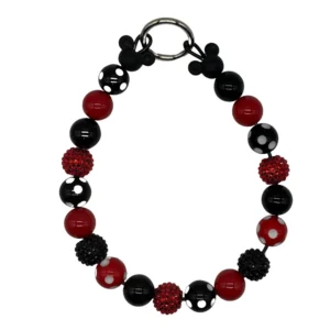 Red and black beaded bracelet with polka dots.