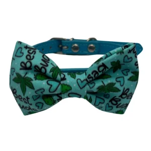 Blue dog collar with bowtie and leaf pattern.