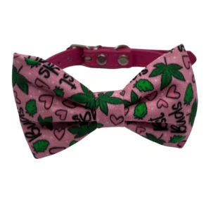 Pink bow tie with green leaf patterns