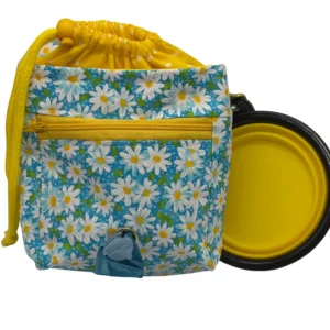 Floral drawstring bag with daisy pattern and zipper.