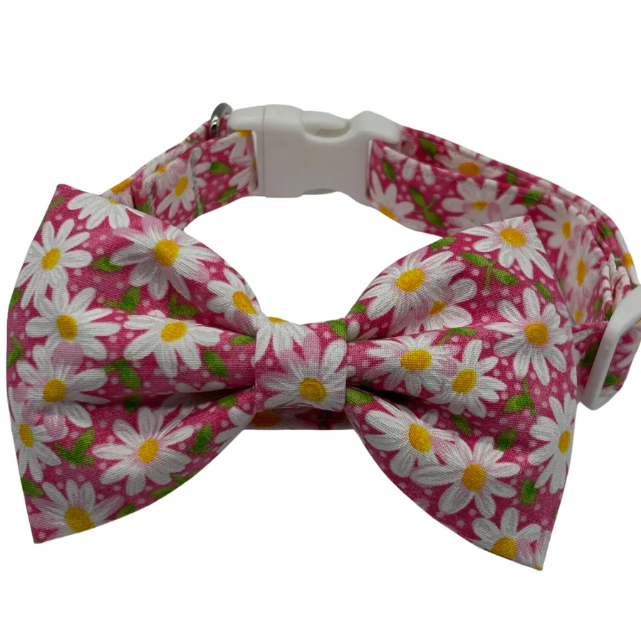 Pink daisy-patterned bow tie collar for pets.