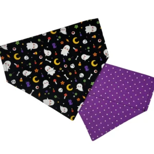 Halloween-themed fabric with ghosts and polka dots