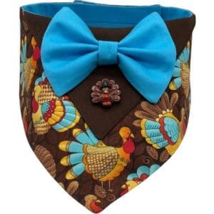 Colorful turkey-themed bandana with blue bow.