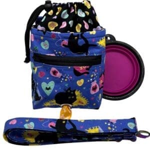 Colorful fabric bag with cat pattern and leash.
