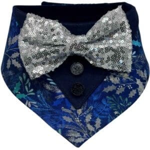 Sequin bow tie on floral patterned fabric.