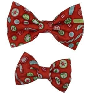 Red Christmas-themed bow ties with candy patterns.
