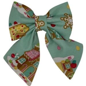 Festive bow with gingerbread house pattern.