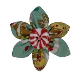 Fabric flower with peppermint swirl button center.