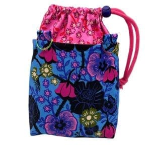 Colorful floral drawstring bag with pink and blue fabric.